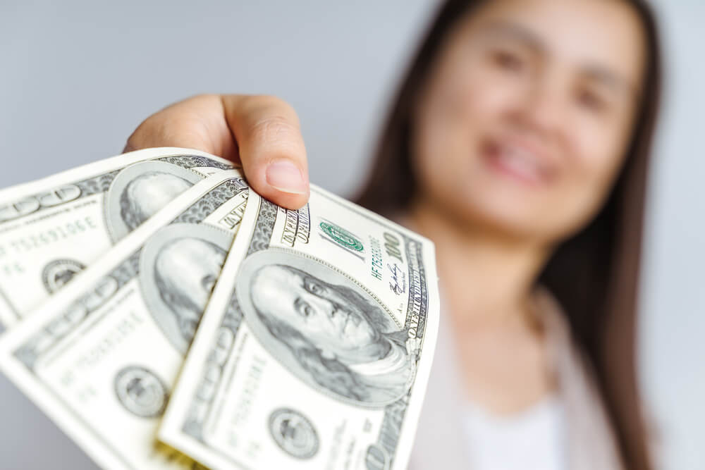 woman with flex loan cash