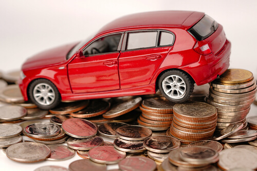 toy car and coins for car title loan idaho