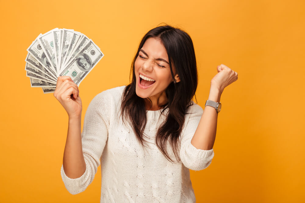 woman excited about title loan cash