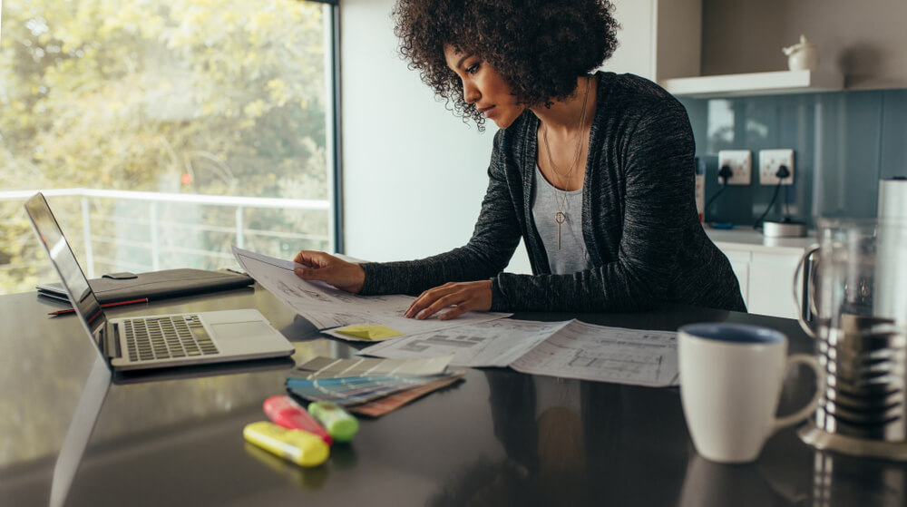 woman gathering documents for a title loan