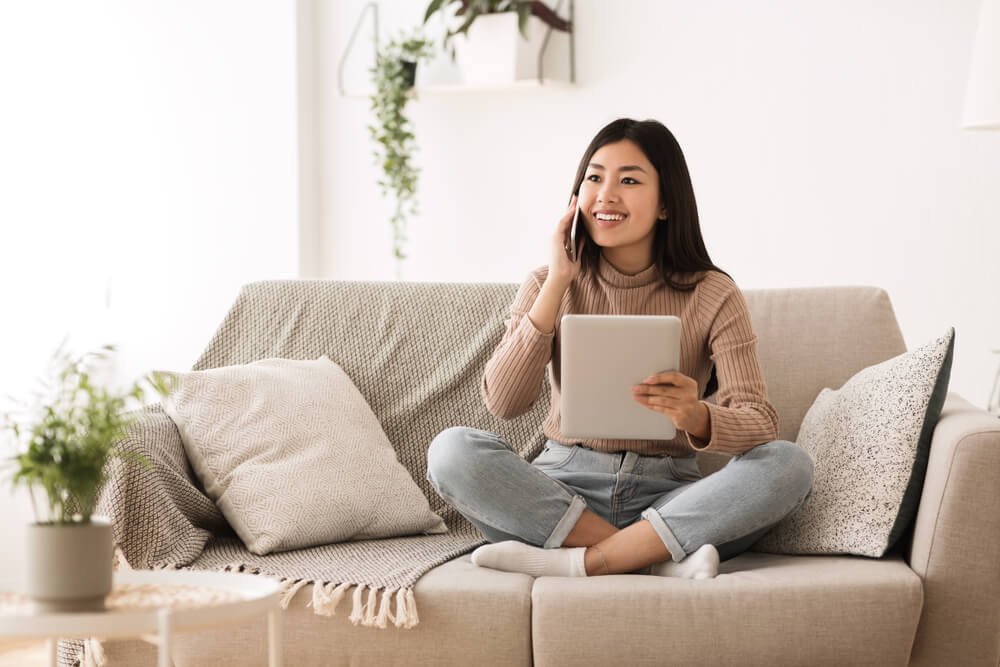 woman applying for an auto title loan by phone