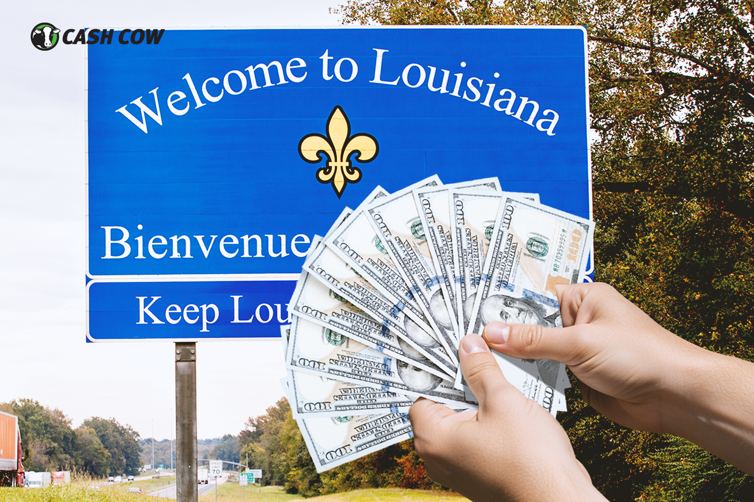 someone holds emergency cash in front of Louisiana sign