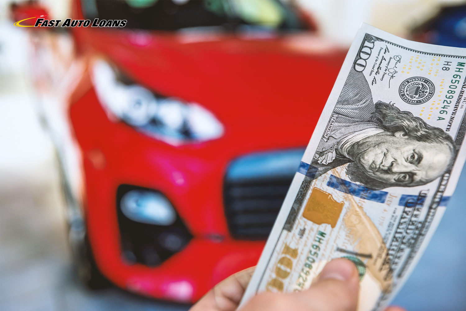 a hand holding $100 registration loan in front of car