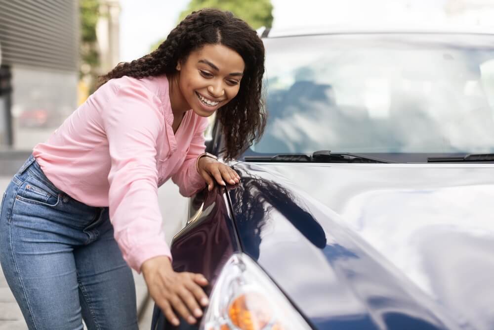 woman with car for auto equity loans