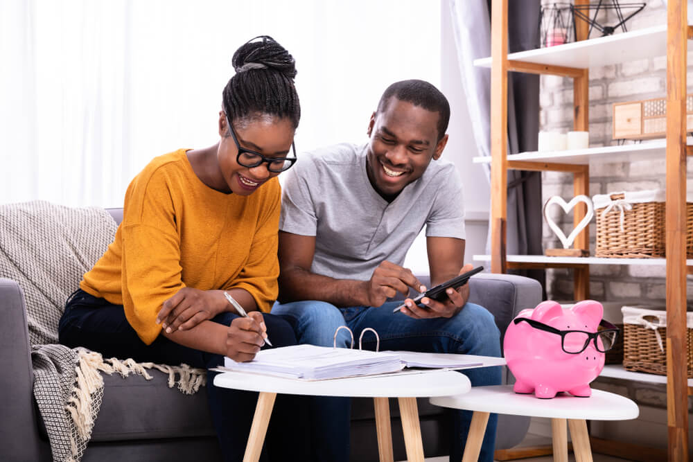 Couple working with car title loan