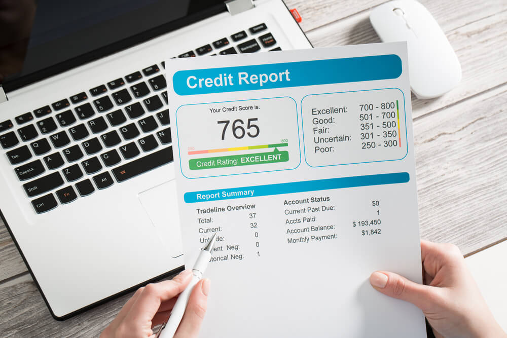 person reviewing their credit report