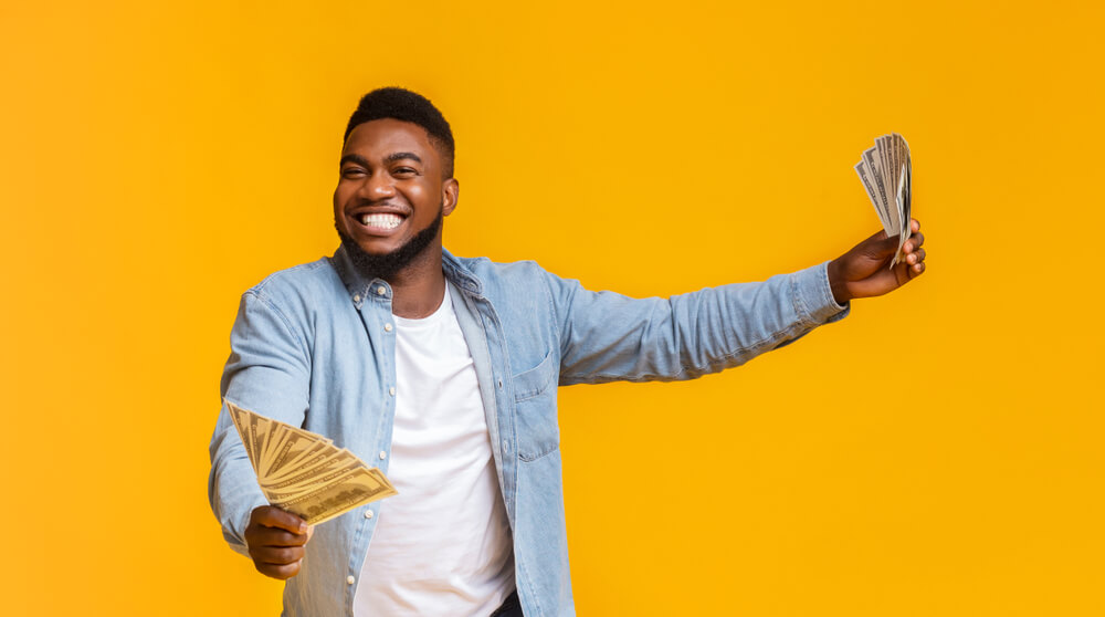 man happy from receiving a payday loan