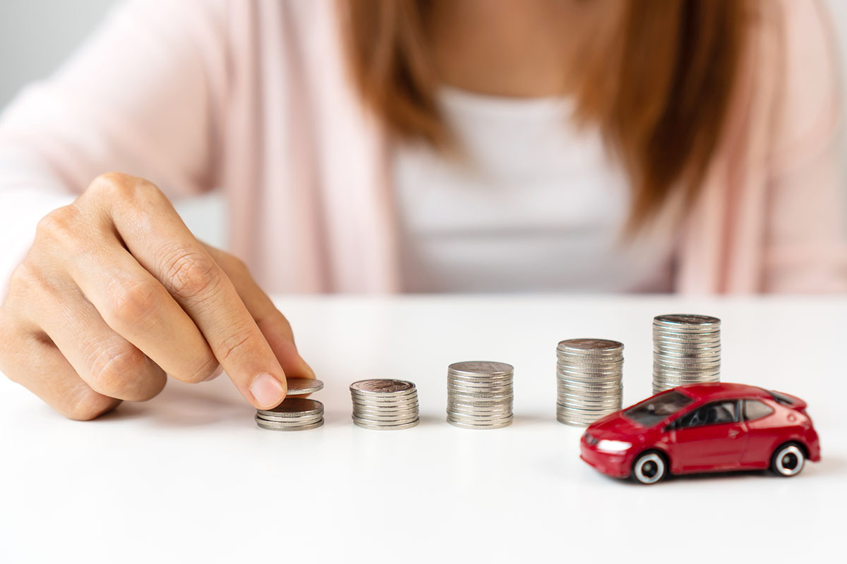 woman with coins after borrowing money against car