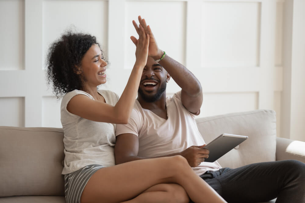 Couple receiving title loan cash