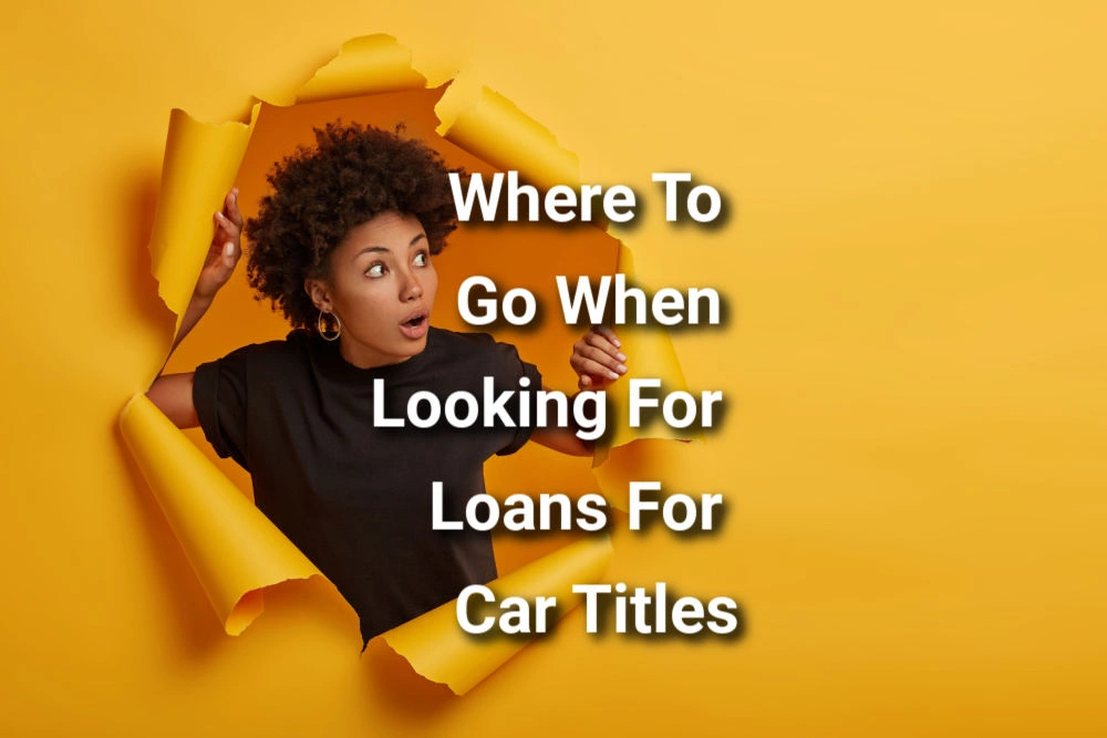 woman busting through wall looking for where to go when looking for loans for car titles