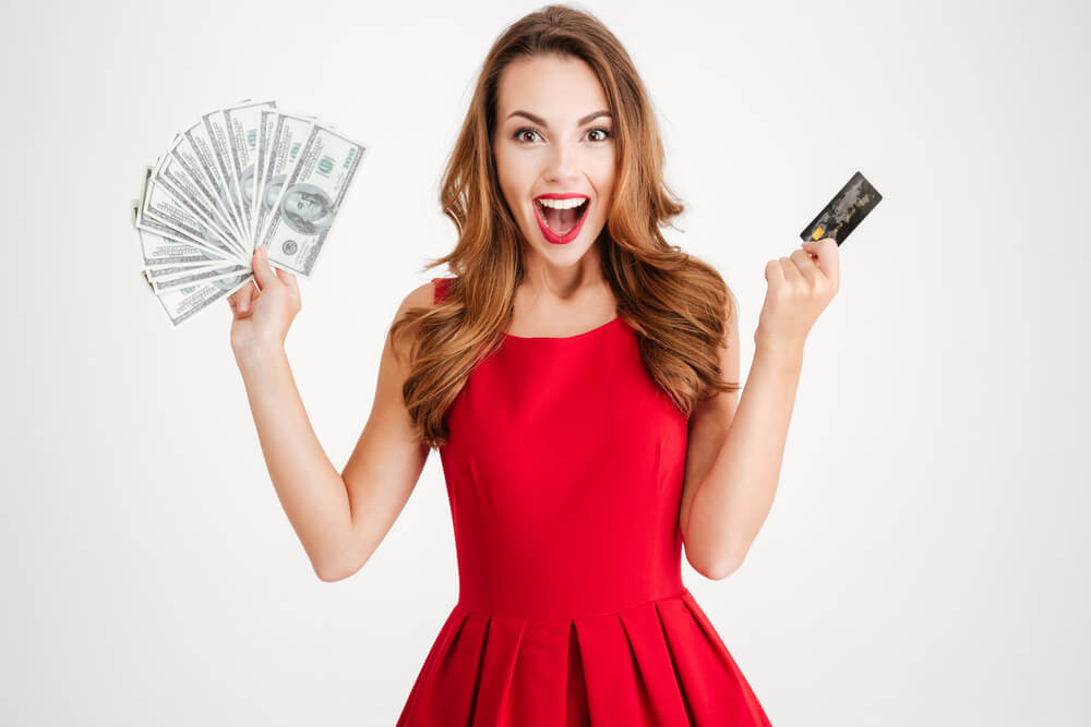 woman excited from receiving online title loan cash fast