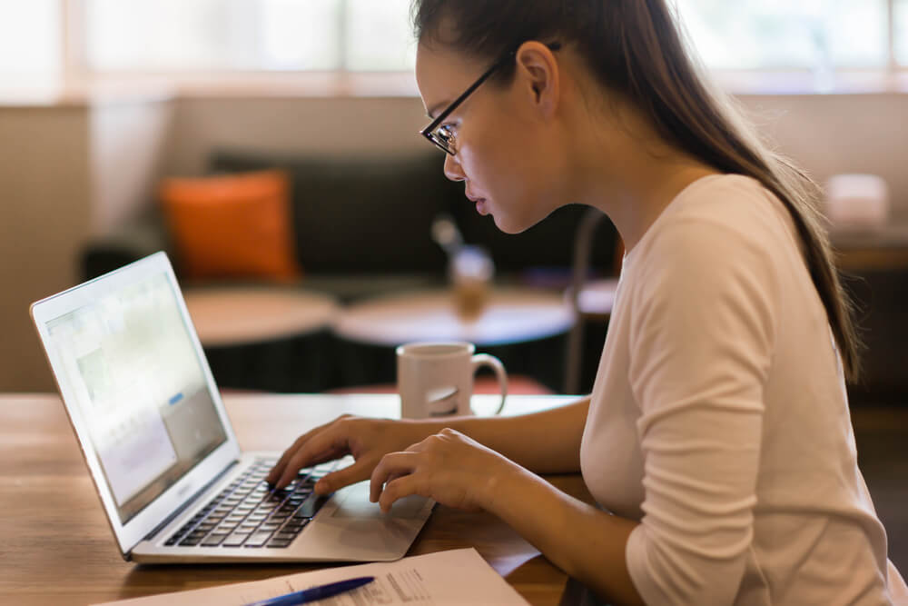 Woman applying for a title loan online