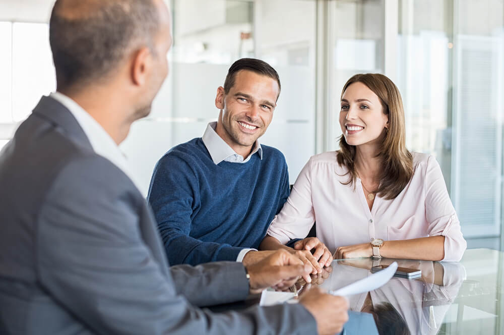 Couple meeting with Carolina payday loans representative