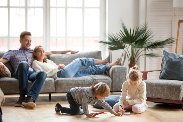 family sitting in home where they used flex loans