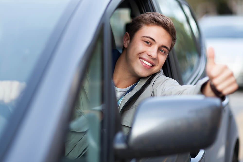 young guy happy with his online title loan