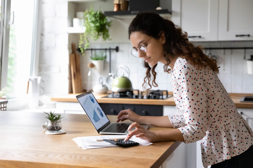 woman saving money on a tight budget