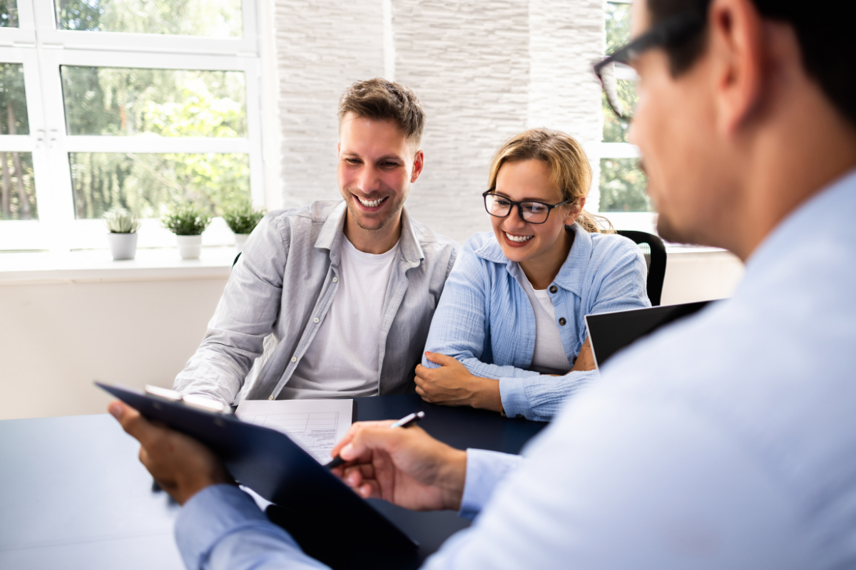 loan representative going over loan options with couple