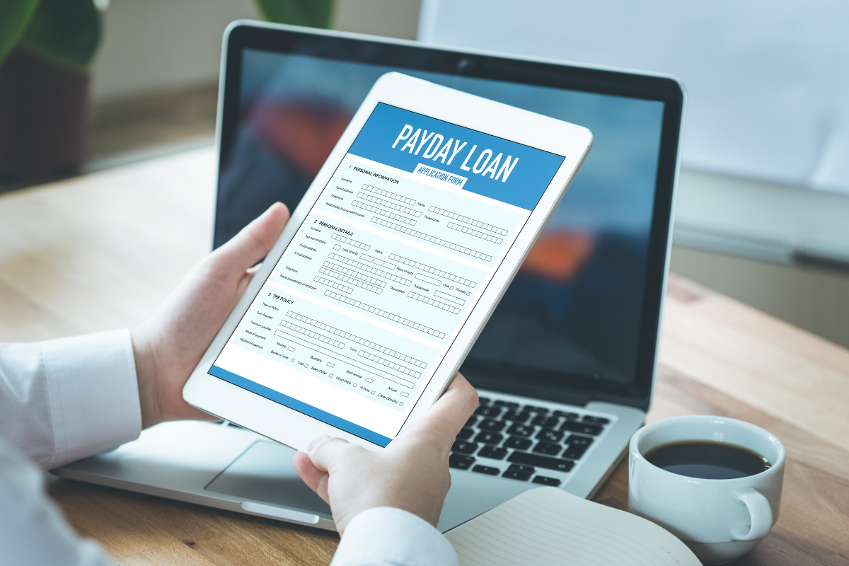 borrower looking at payday loan application online