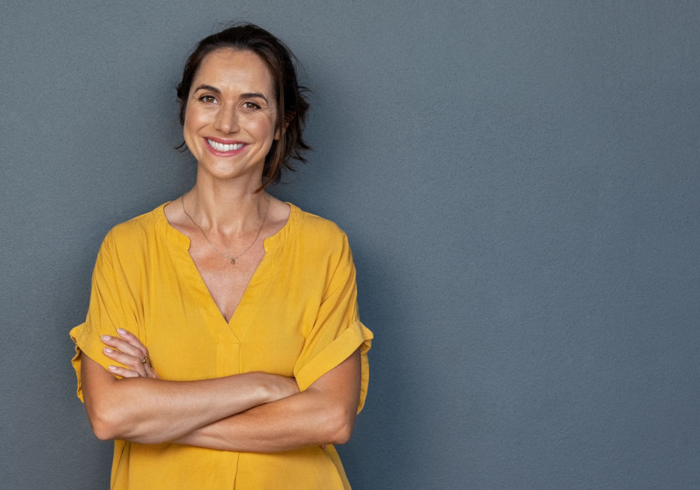 woman smiles after learning about Lake City, FL, payday loans