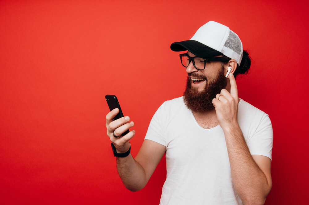 man listens to podcasts helping to become financially fit