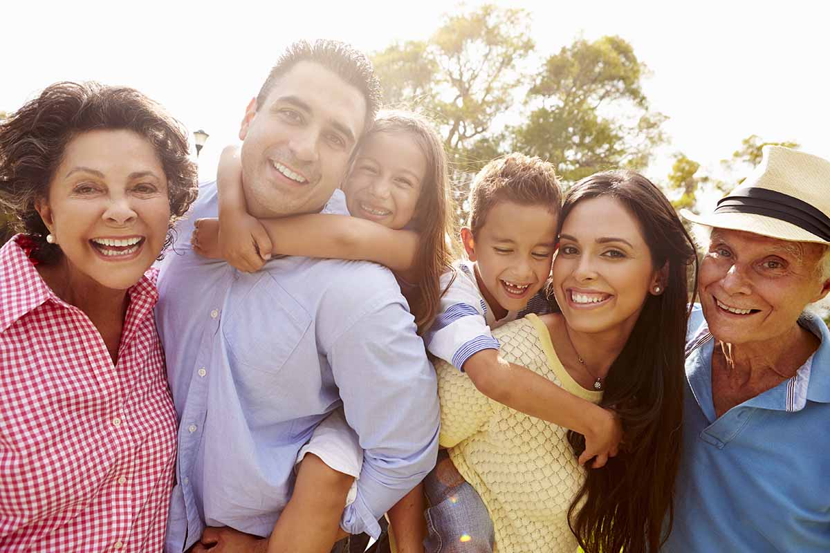 A happy multigenerational family enjoying time outdoors, symbolizing financial security and opportunities with title loans.