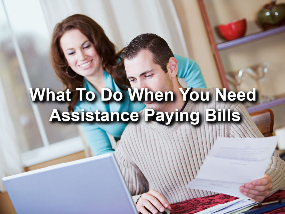 couple using payday loan assistance paying bills