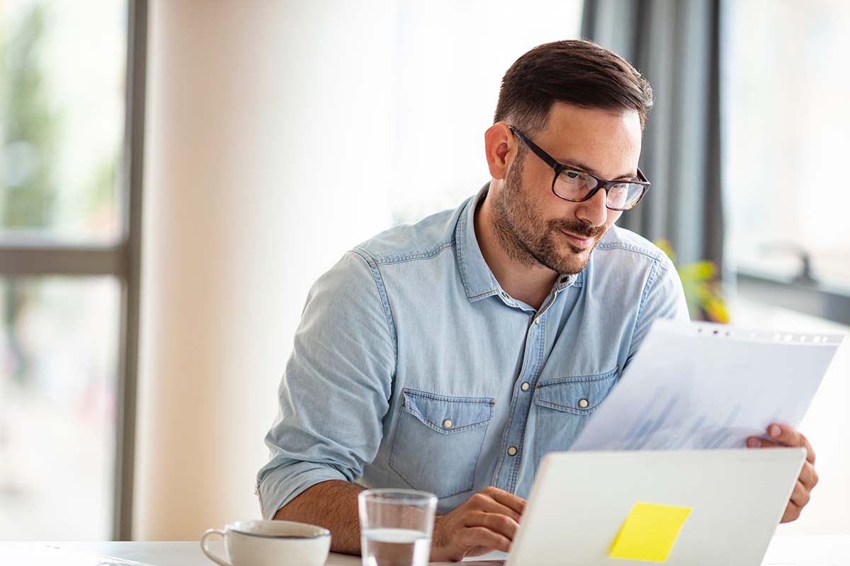 man looking over title loan