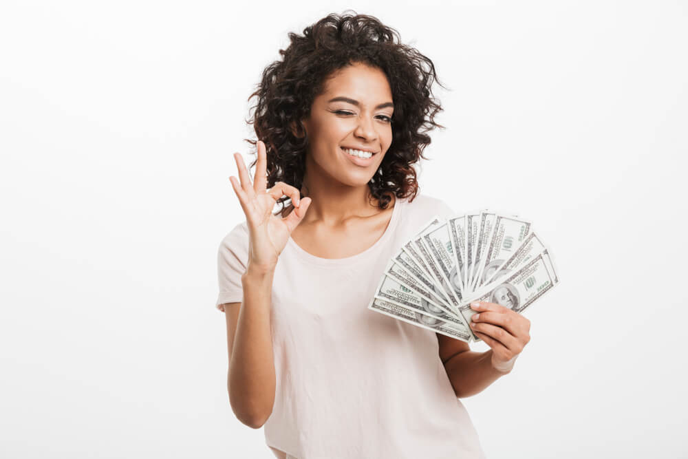 Woman holding same-day title pawn