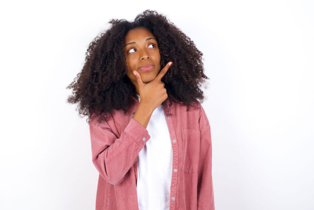 woman wondering about car title loans