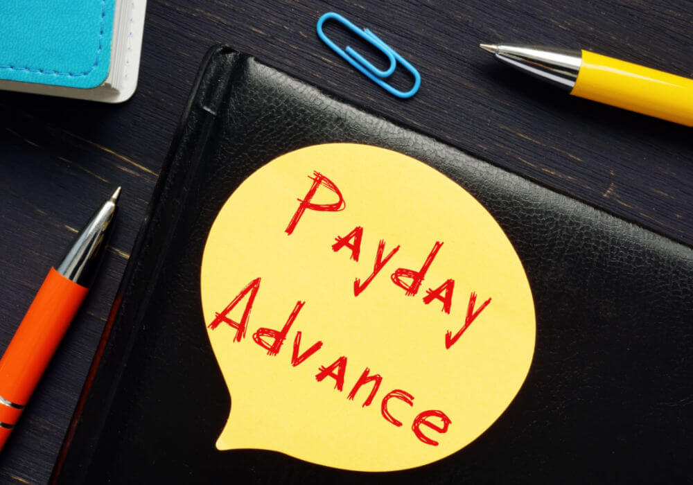 payday advance written on paper