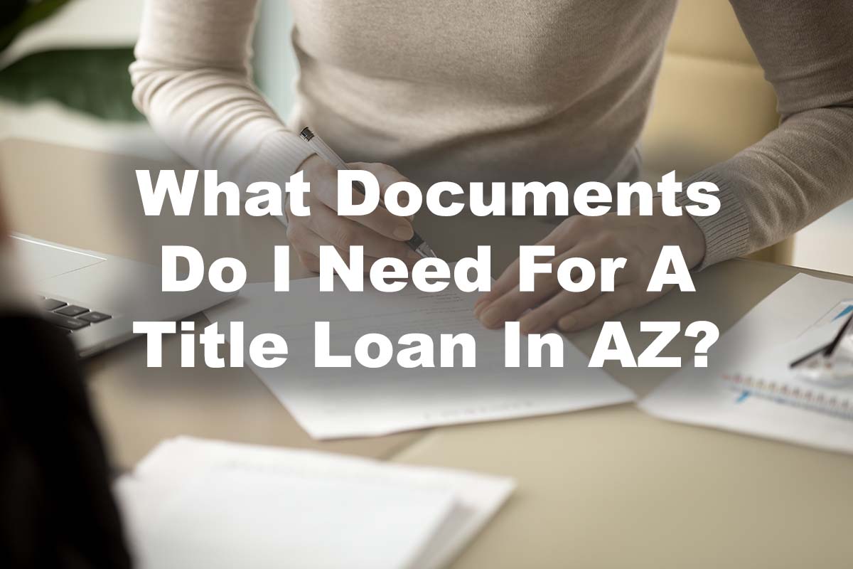 woman filling out paperwork for title loan