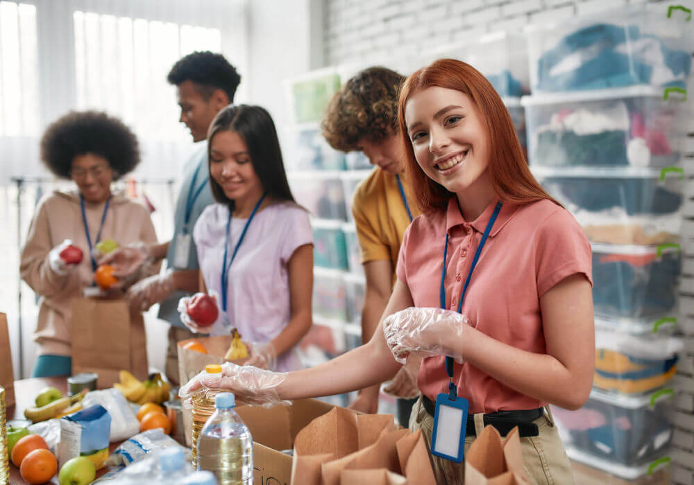 A diverse group of volunteers demonstrates how to be charitable.