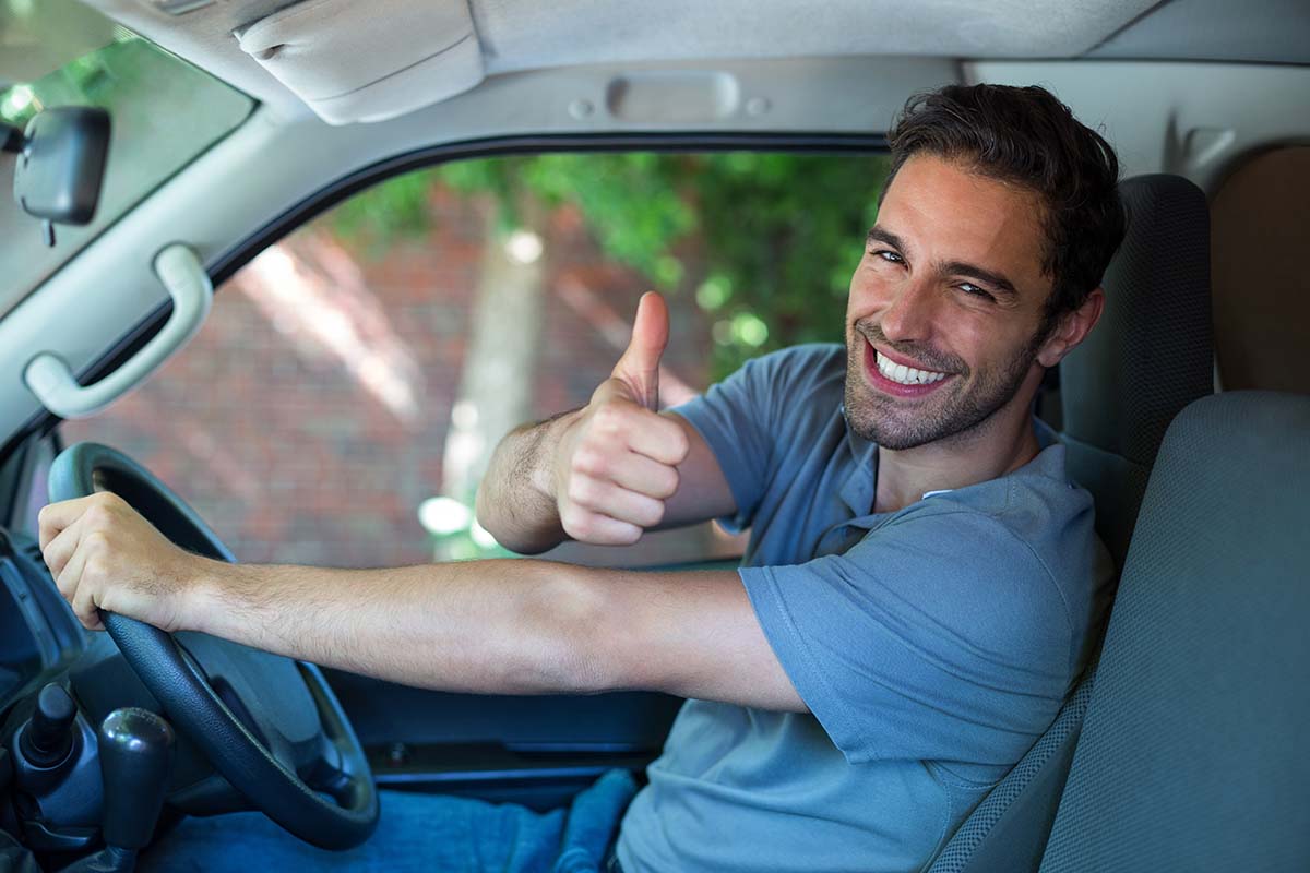 man happy with car for title loan