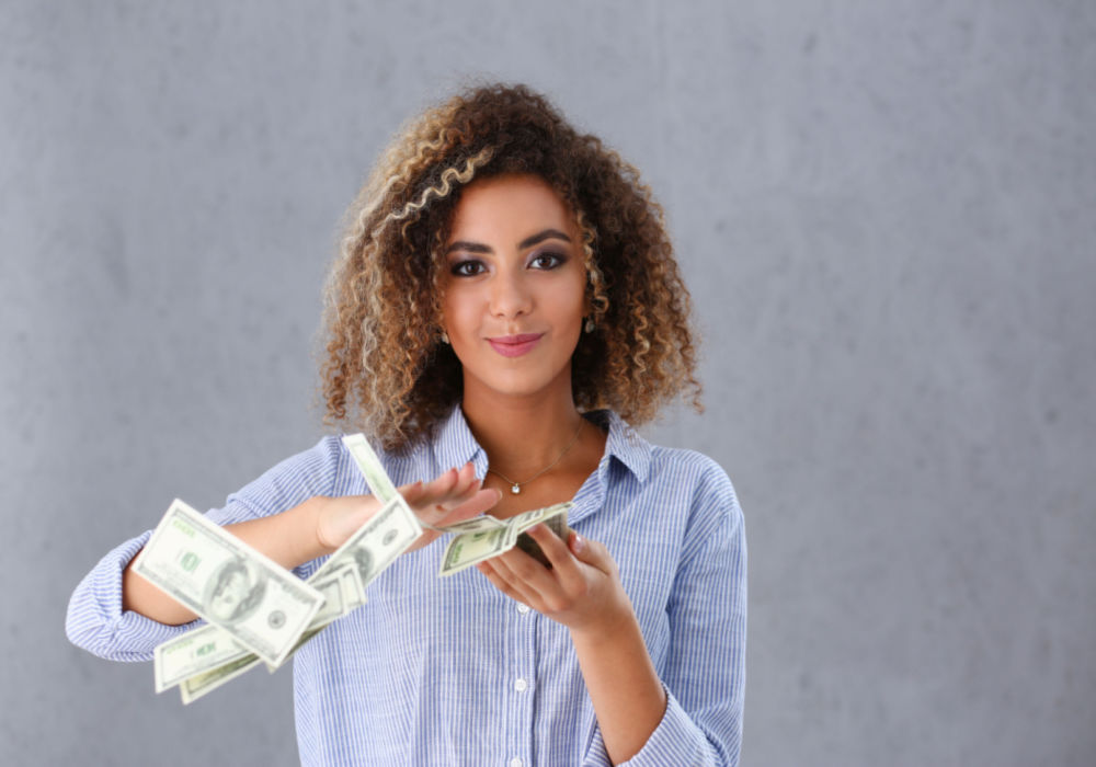 girl celebrating financial success with online title loans