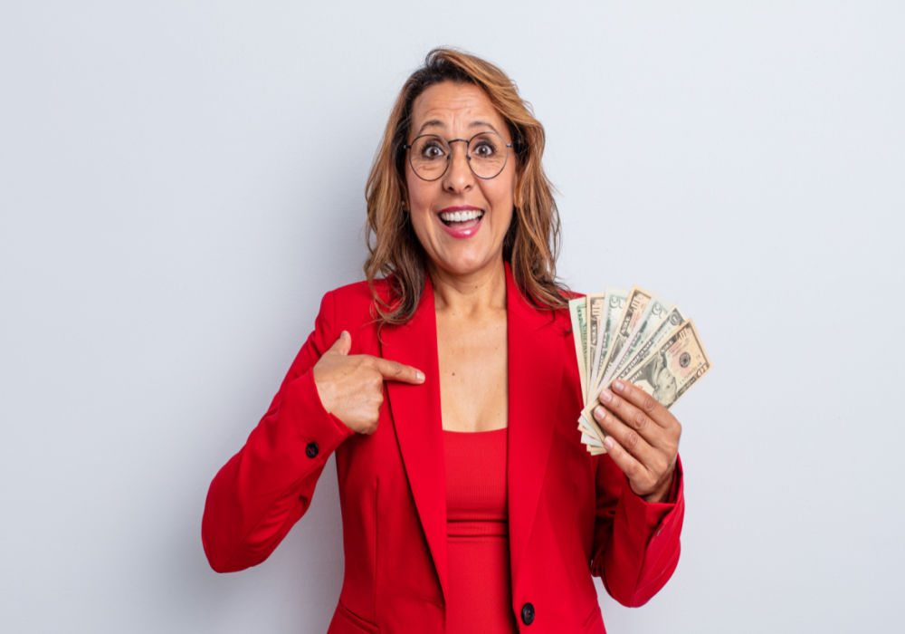 Hispanic woman happy with extra money