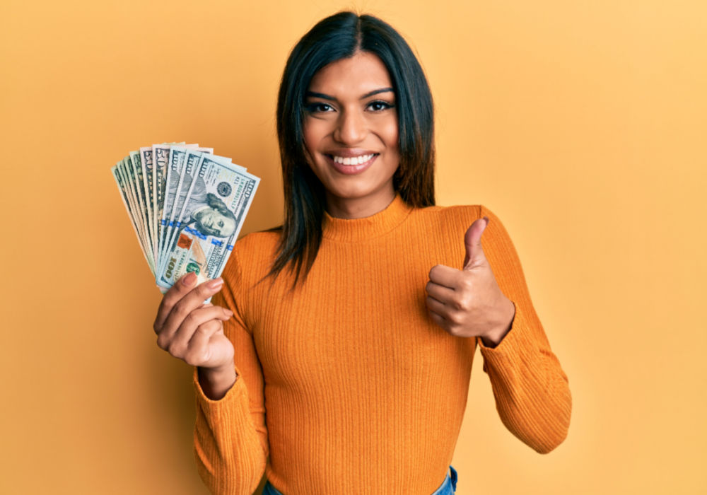 Hispanic woman with payday loan cash