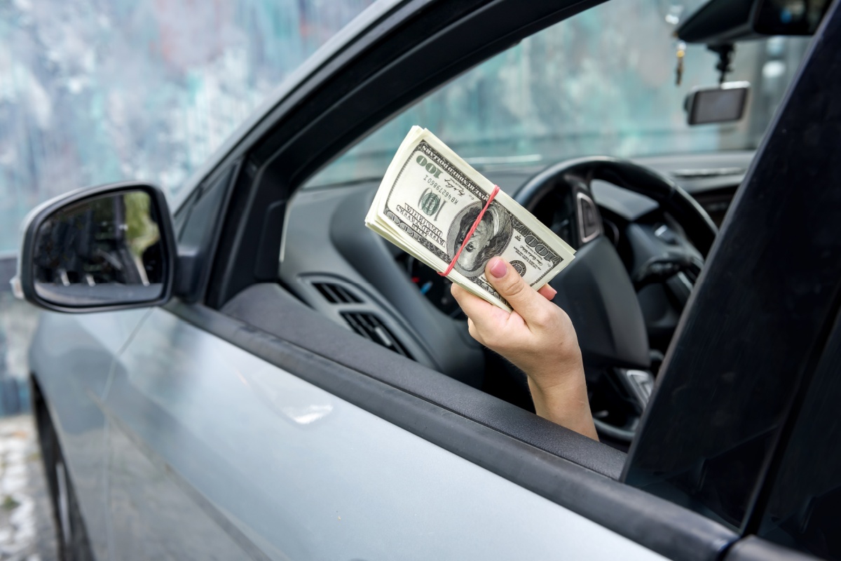 holding title loan cash in their car