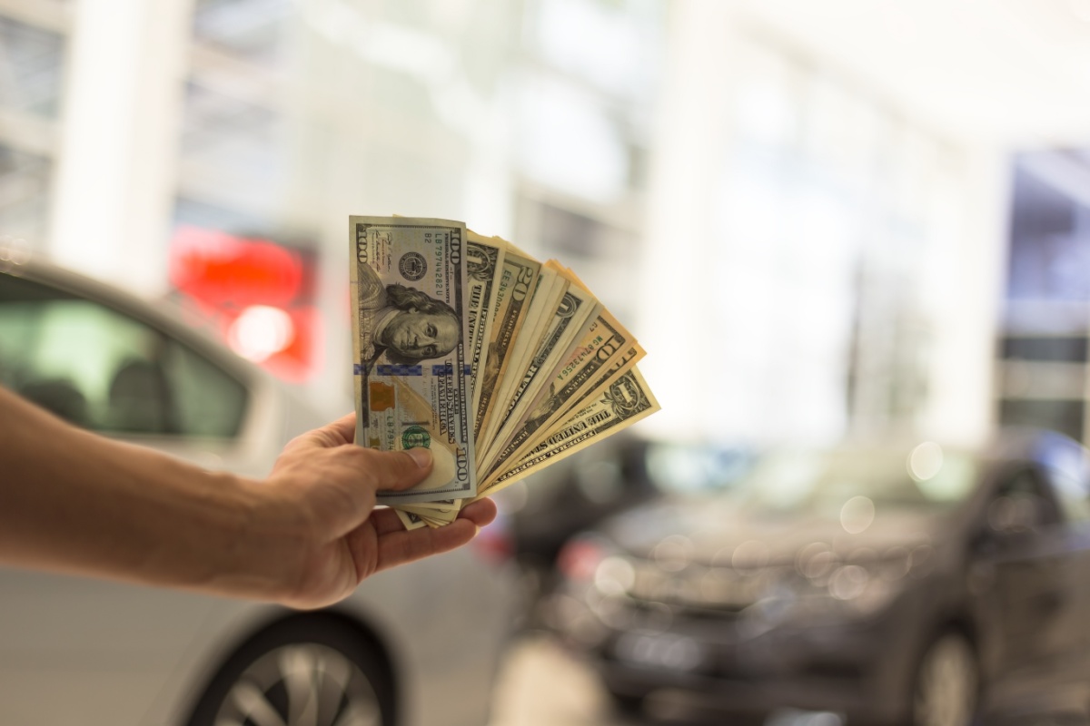 holding title pawn cash outside vehicle
