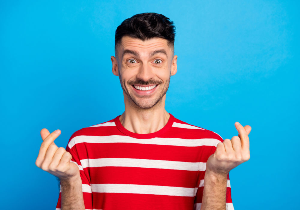 man happy to learn about tips to get money quickly