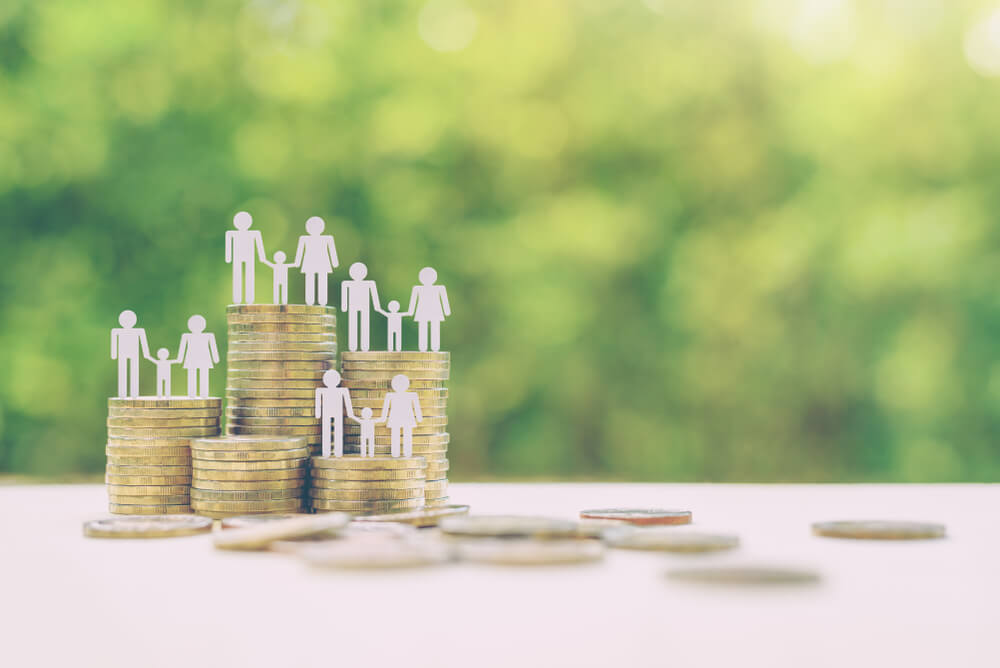 paper cut outs of silhouettes of families on top of coins to signify best money saving tips with auto title loans