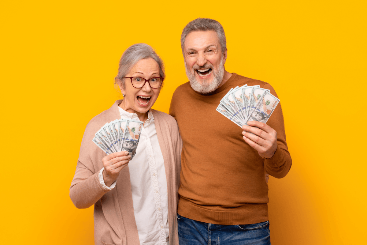 man and woman holding loans for retirees