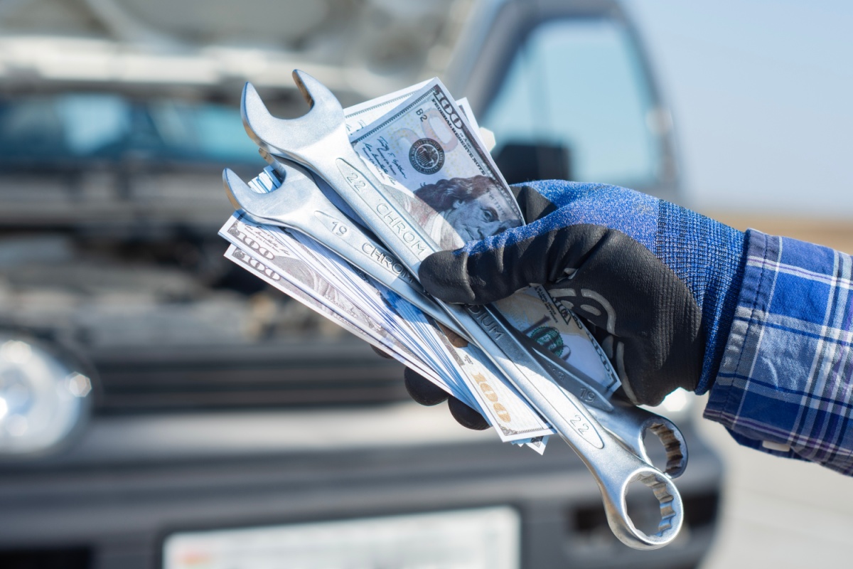 mechanic holds title loan cash for auto repairs