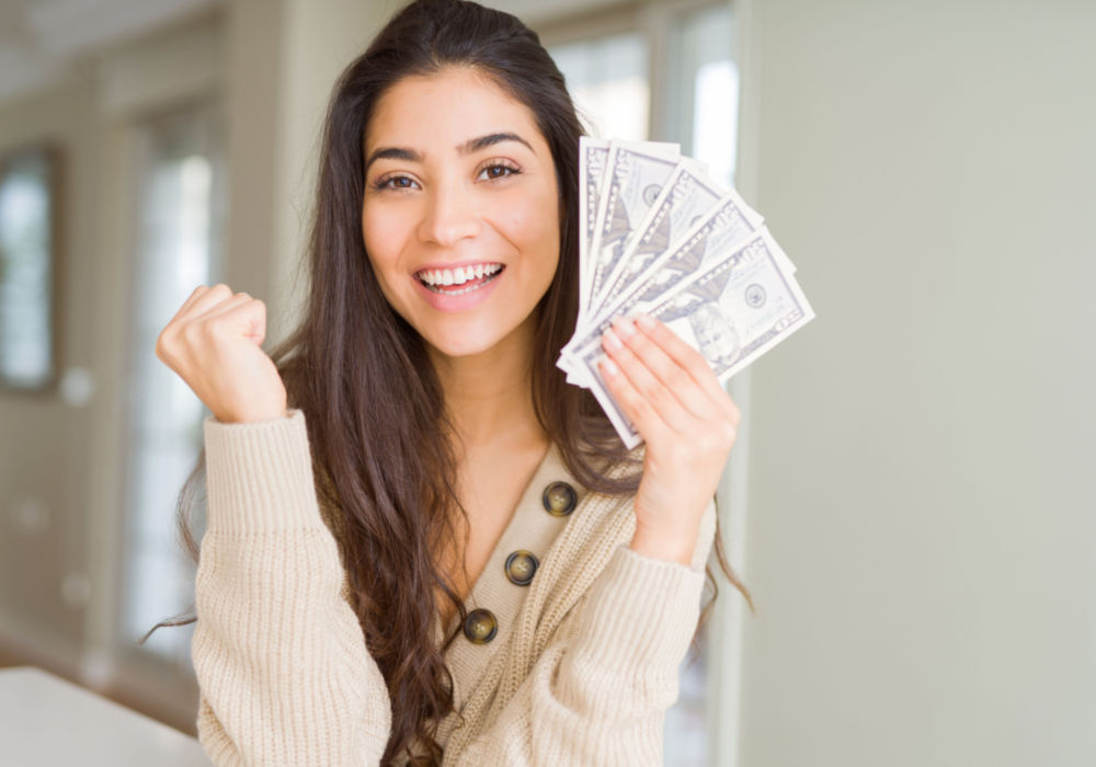 woman excited about getting payday loan money