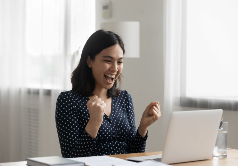 woman happy she solved her financial emergency