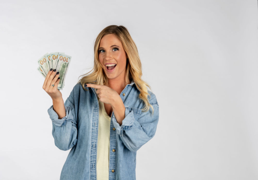 woman holding installment cash 