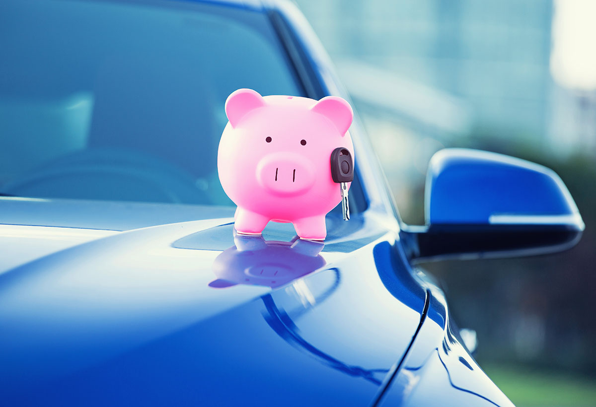 piggy bank with car key on top of car for getting fast cash from Arizona registration loan