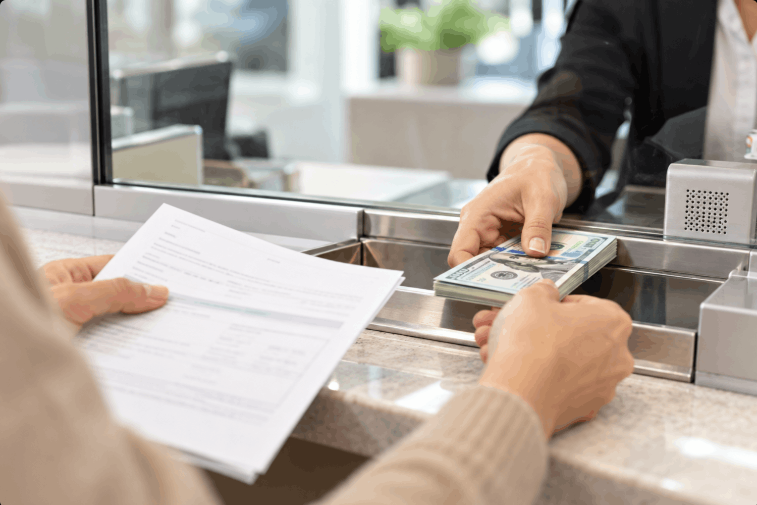 Man receiving money with a document in hand