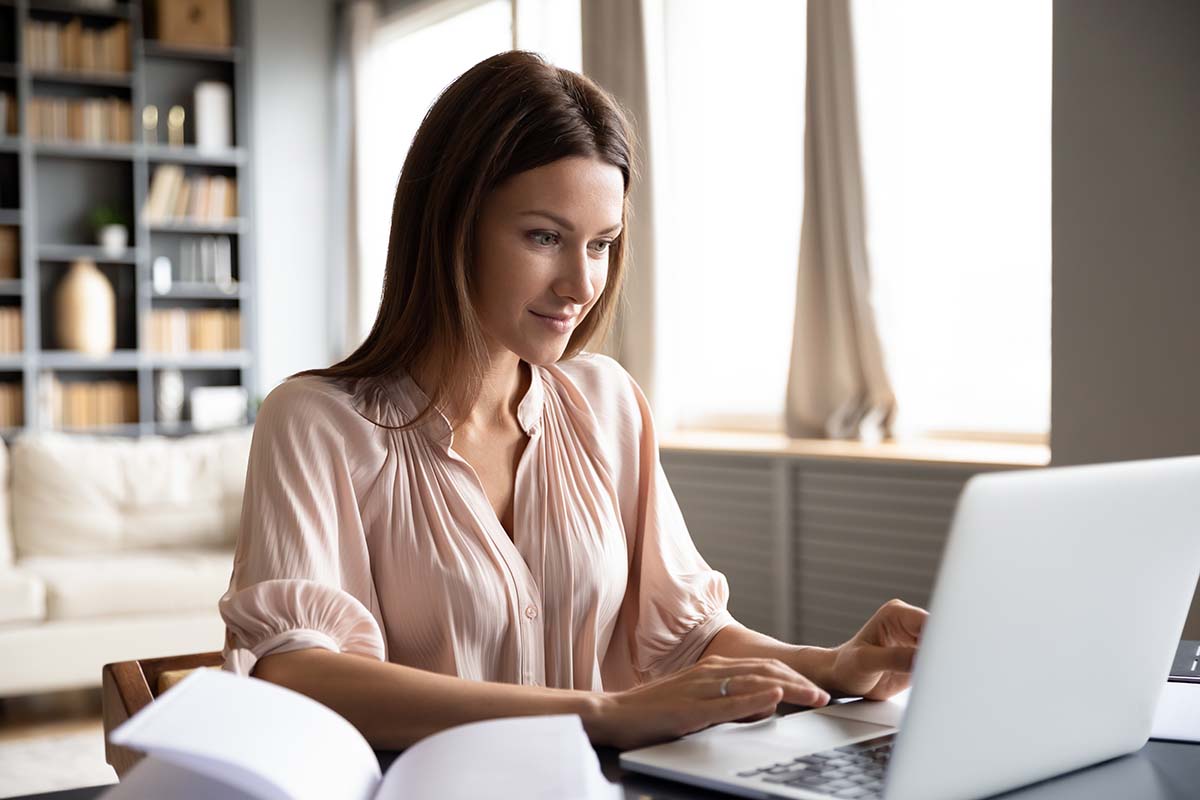 woman looking online for loans