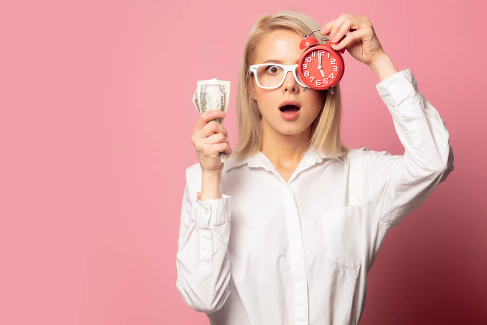 woman with cash from quick installment loans