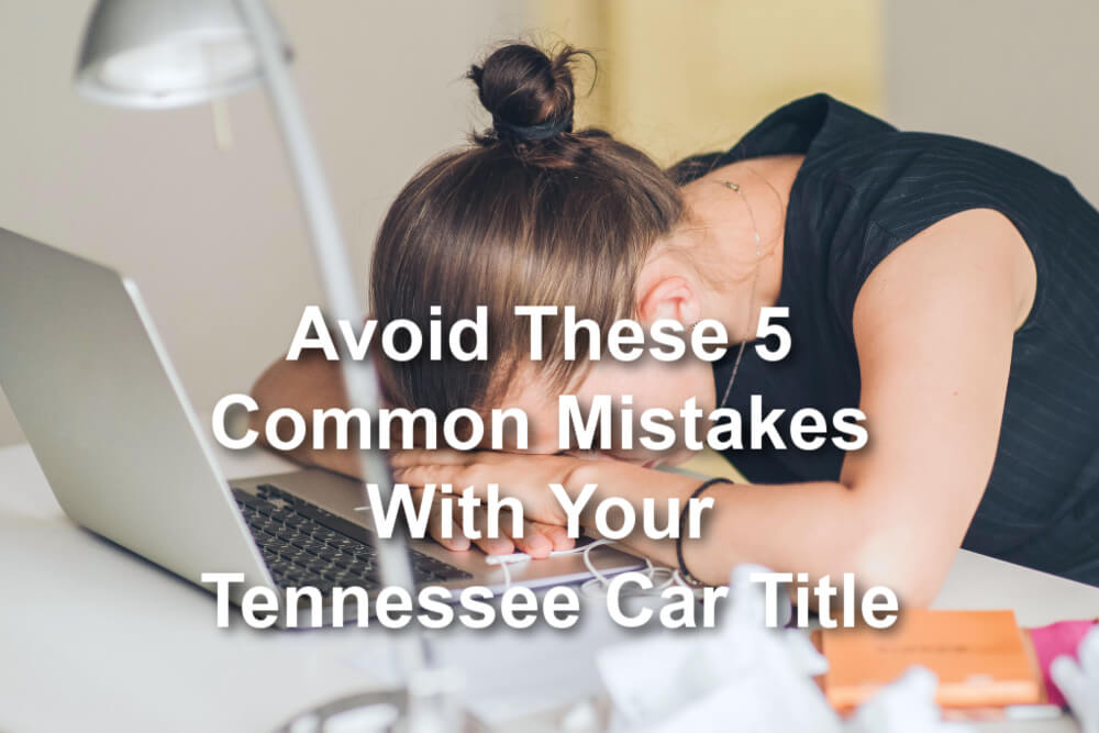 woman with her head down on computer with overlay text Avoid these 5 common mistakes with your Tennesse car title